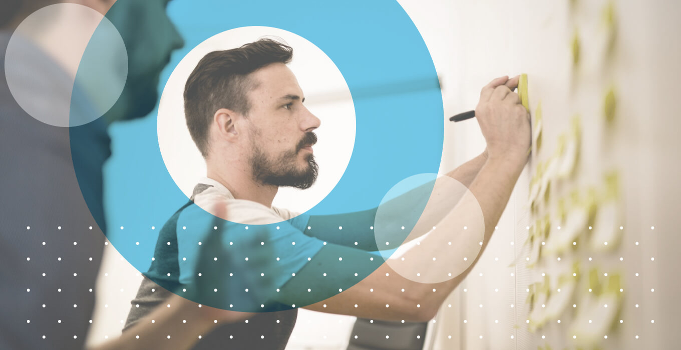 Affinity diagrams: Everything you need to know 2 Man doing affinity diagram